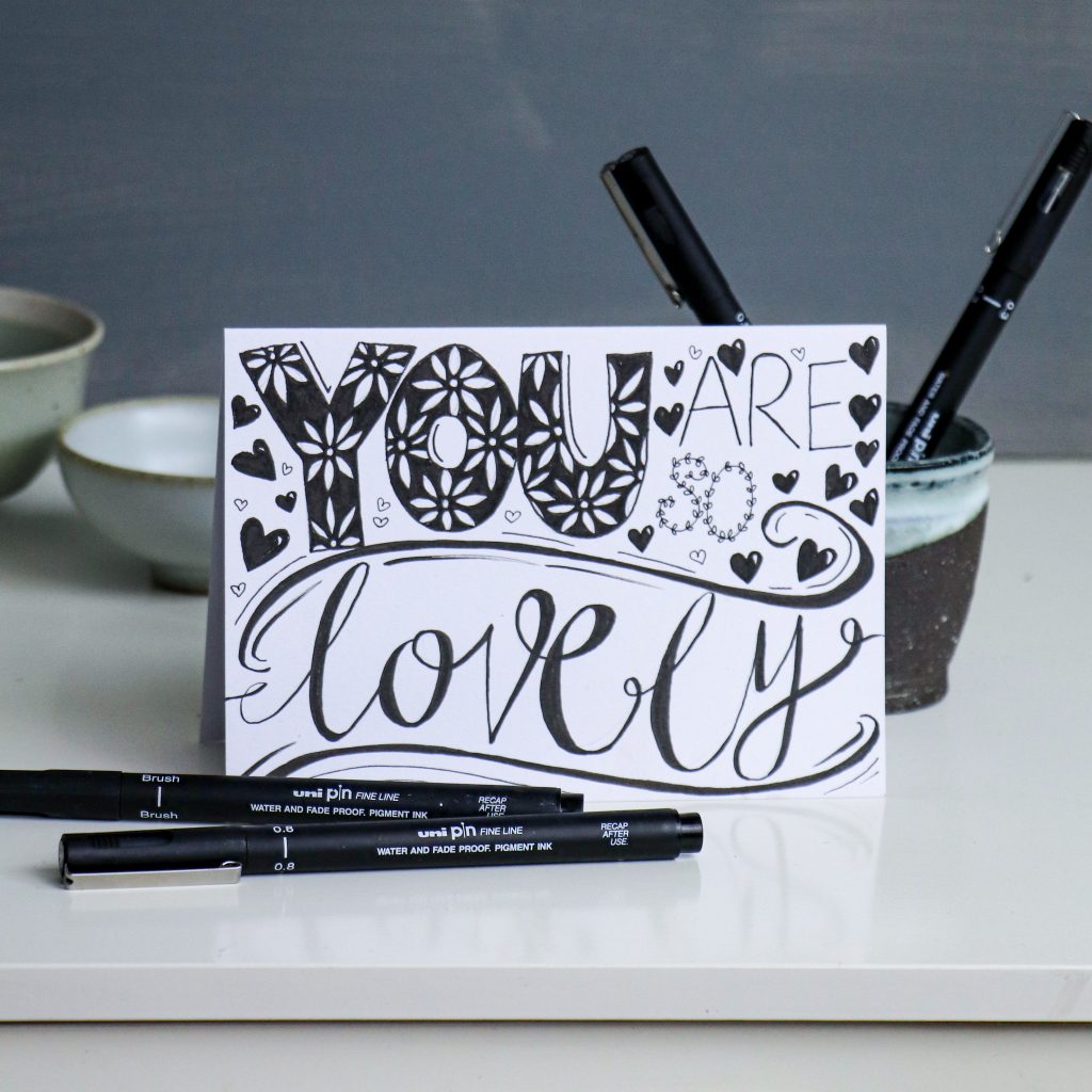 Hand-lettering card with uni-PIN pens