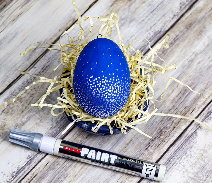 Silver and blue ceramic egg paint marker