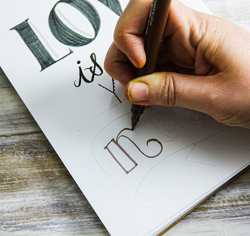 Hand-lettering guide with uni-PIN